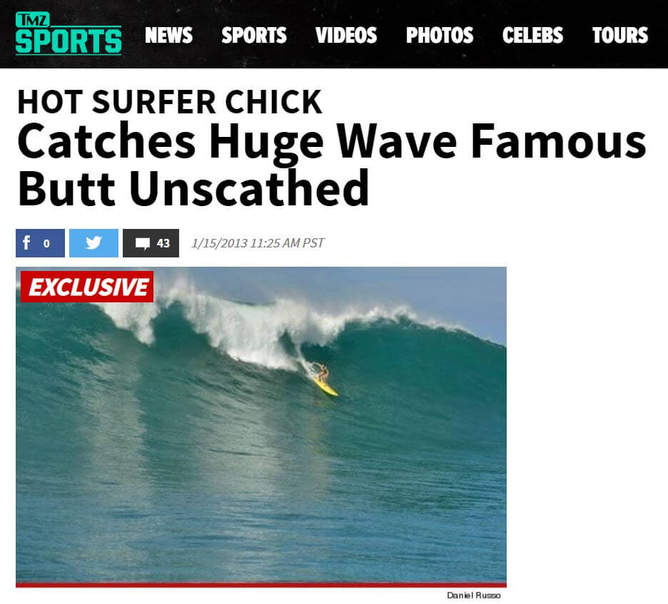 hot surfer chick catches big wave